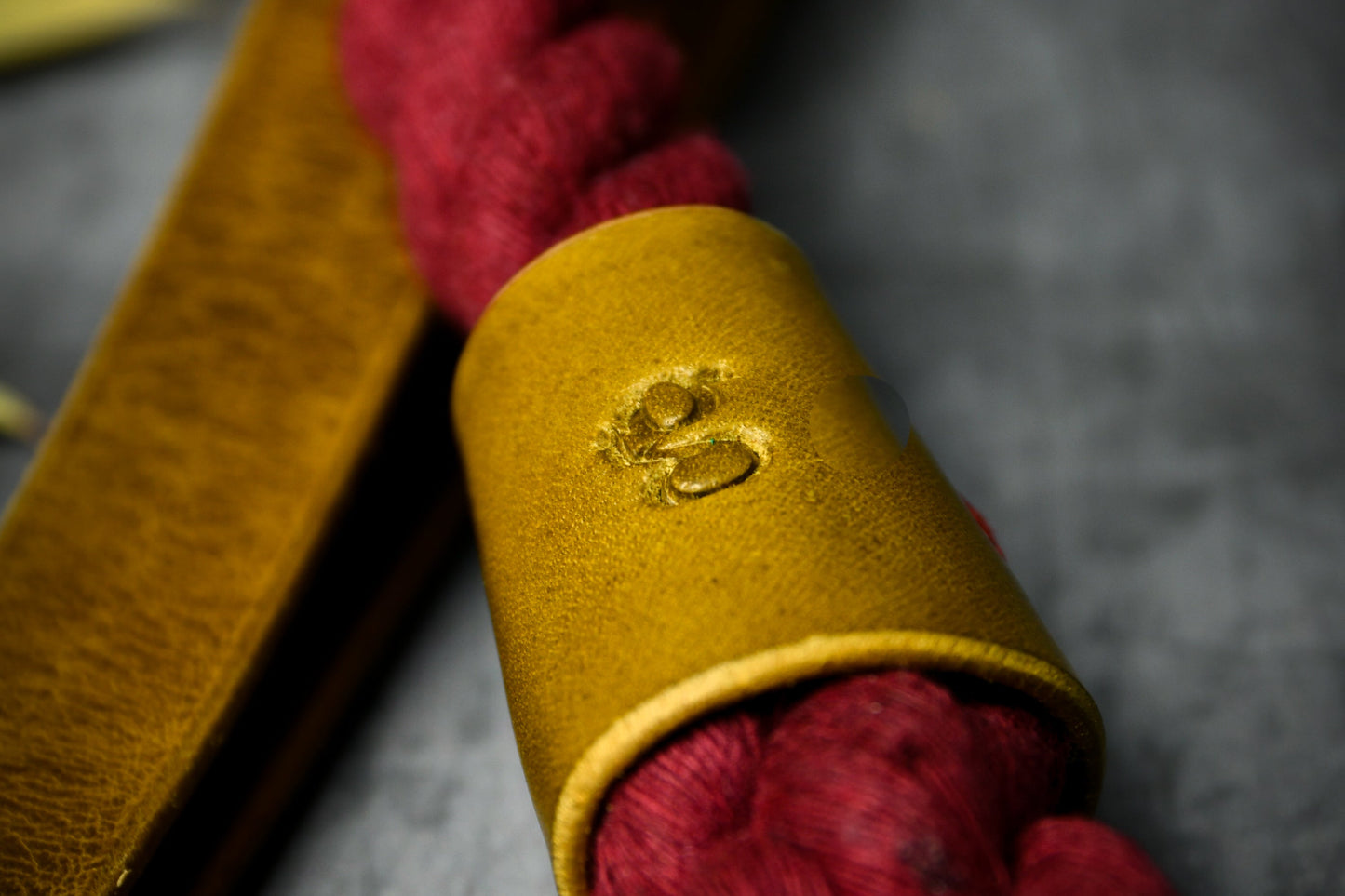 Handcrafted Burgundy Lead with Leaf Green Leather.