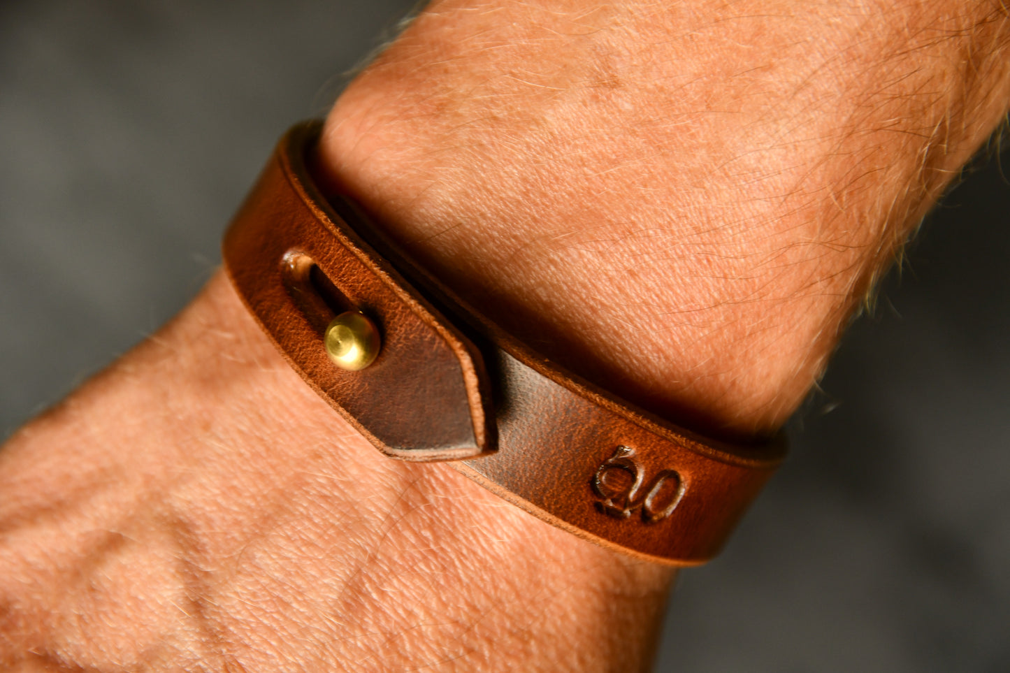 Handcrafted Unisex Leather Bracelet in Chestnuut. For those willing to proudly match their hound's Gentry attire.