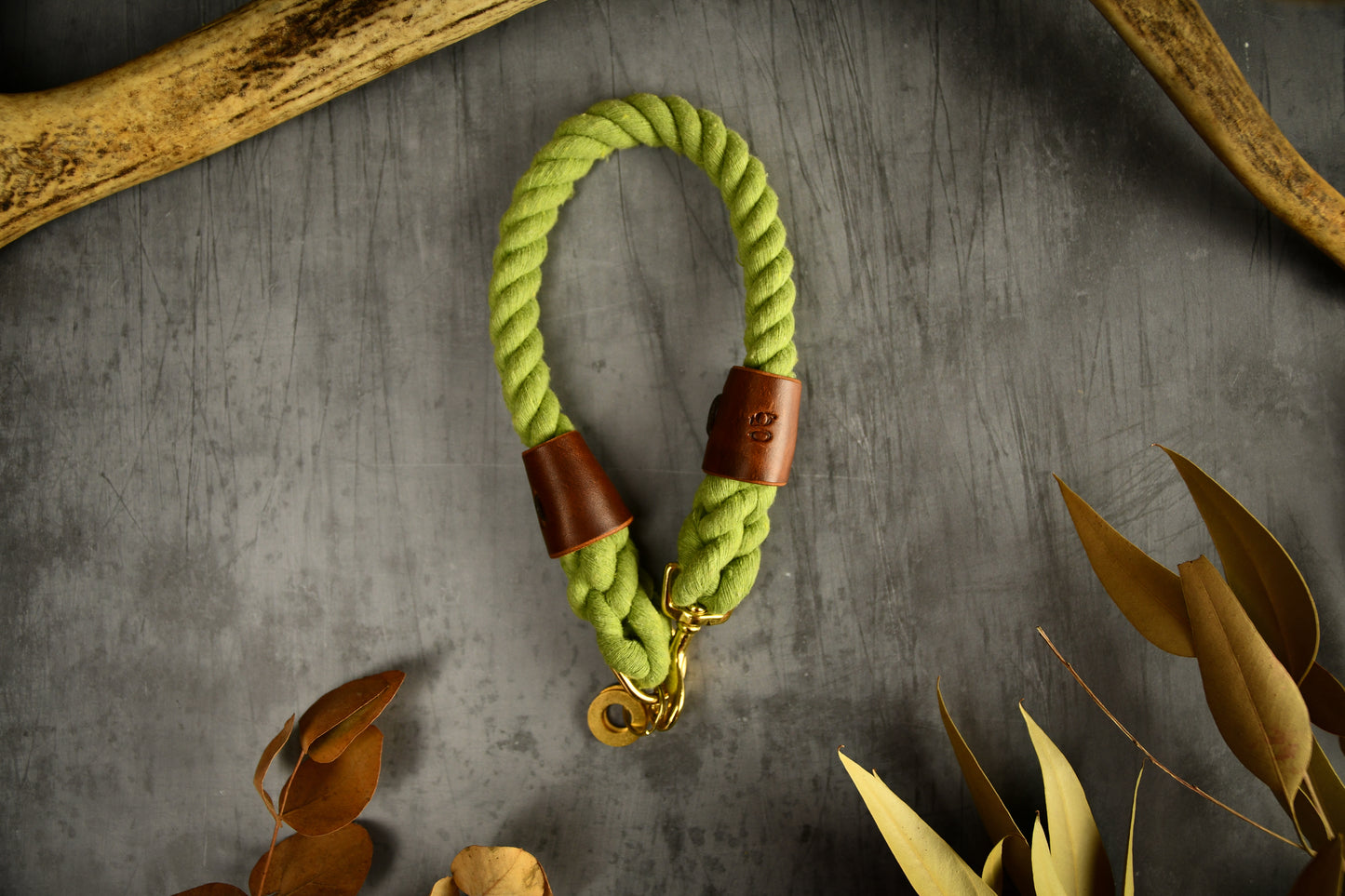 Handmade Olive Green Rope Dog Collar. Plastic free, 100% cotton rope with chestnut leather sleeves.
