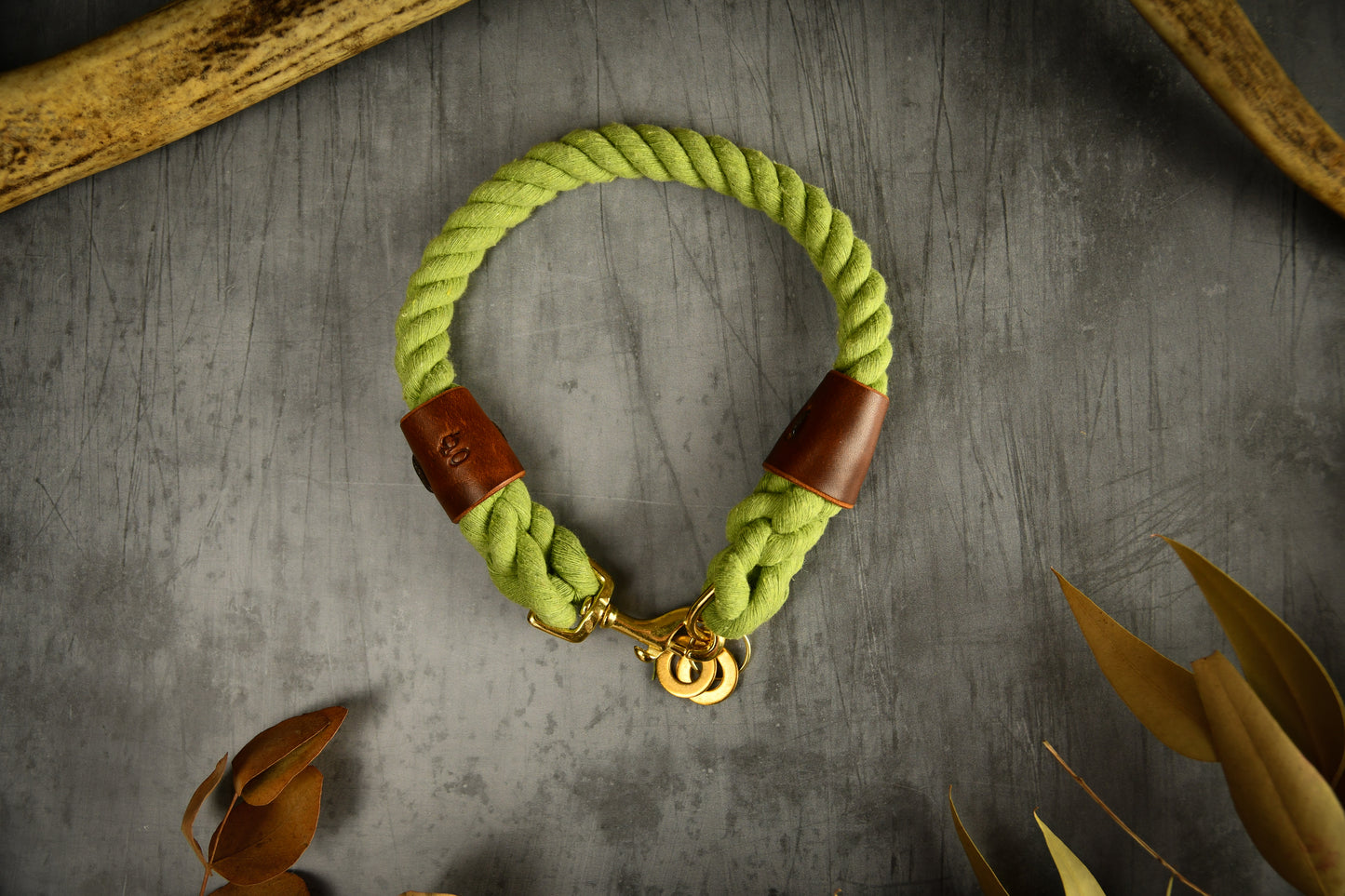 Handmade Olive Green Rope Dog Collar. Plastic free, 100% cotton rope with chestnut leather sleeves.