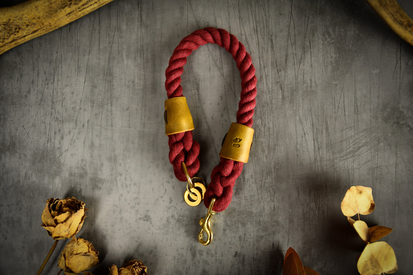 Handmade Burgundy Rope Dog Collar. Plastic free, 100% cotton rope with leaf green leather sleeves.