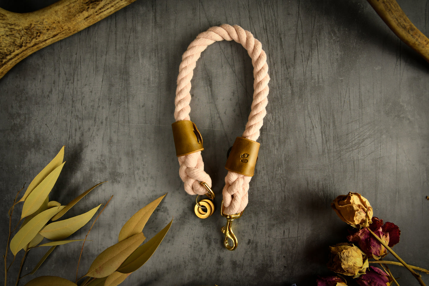 Handmade Pastel Pink Rope Dog Collar. Plastic free, 100% cotton rope with leaf green leather sleeves.