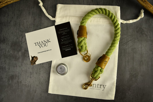 Handmade Olive Green Rope Dog Collar. Plastic free, 100% cotton rope with leaf green leather sleeves.