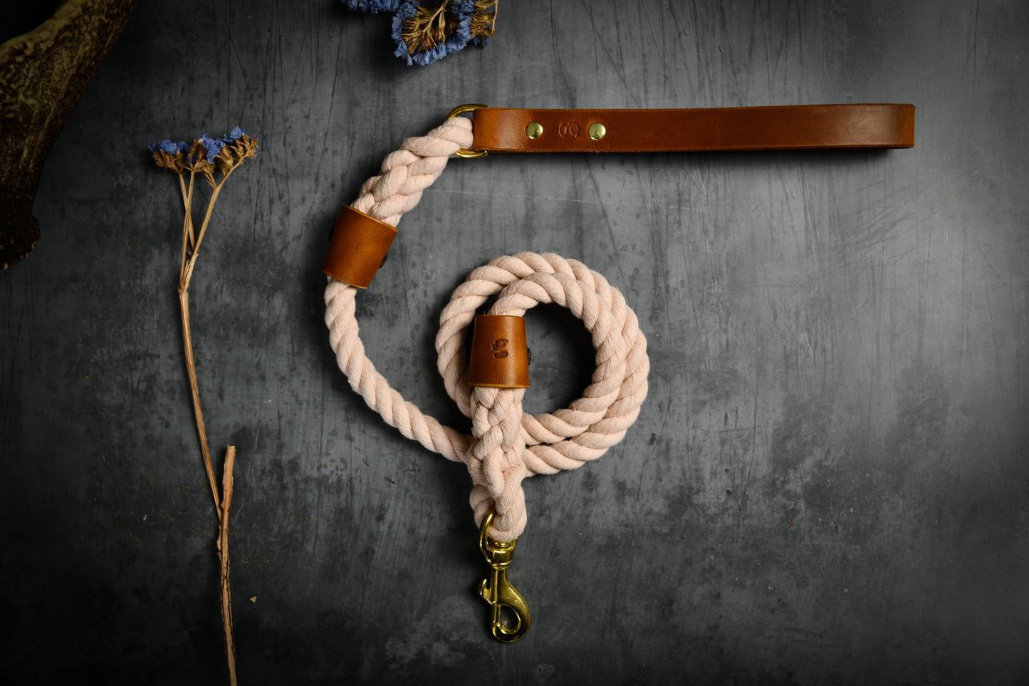 Handcrafted Pastel Pink Lead with Tan Leather Sleeves.