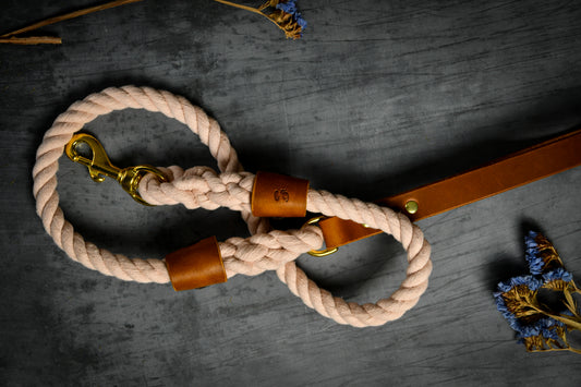 Handcrafted Pastel Pink Lead with Tan Leather Sleeves.