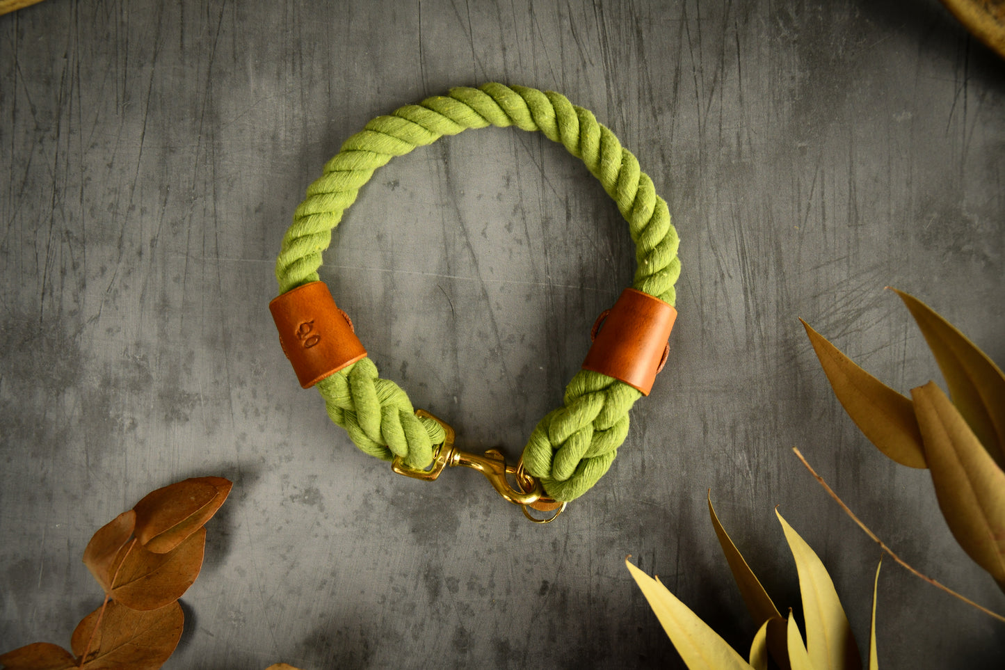 Handmade Olive Green Rope Dog Collar. Plastic free, 100% cotton rope with light tan leather sleeves.