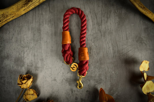 Handmade Burgundy Rope Dog Collar. Plastic free, 100% cotton rope with light tan leather sleeves.