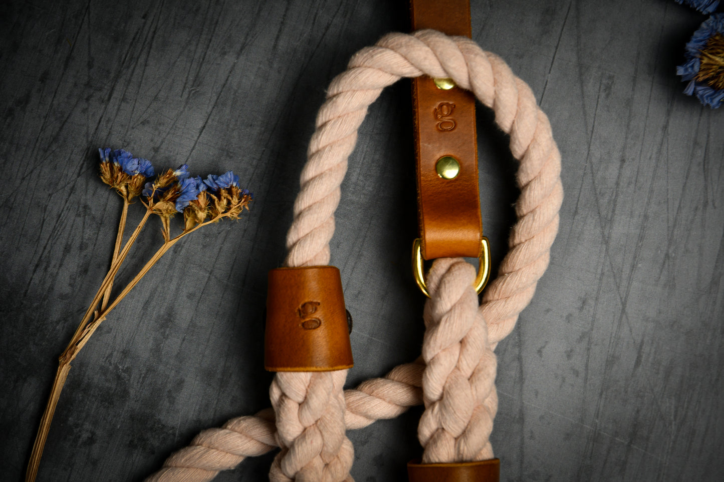 Handcrafted Pastel Pink Lead with Tan Leather Sleeves.